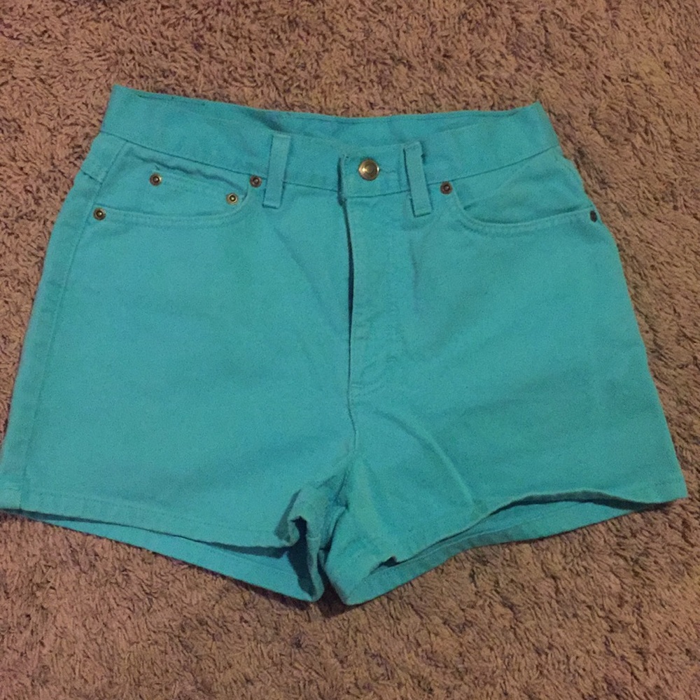 Vintage high waisted teal jean shorts.